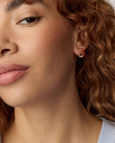 CAILIN CRYSTAL HUGGIE EARRINGS GOLD BURGUNDY CRYSTAL
