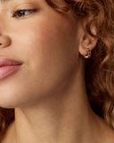 CAILIN CRYSTAL HUGGIE EARRINGS GOLD PURPLE CRYSTAL