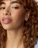 CAILIN CRYSTAL HUGGIE EARRINGS GOLD WHITE IRIDESCENT CRYSTAL