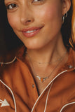 LONGHORN SHORT PENDANT NECKLACE GOLD VARIEGATED ORANGE MAGNESITE